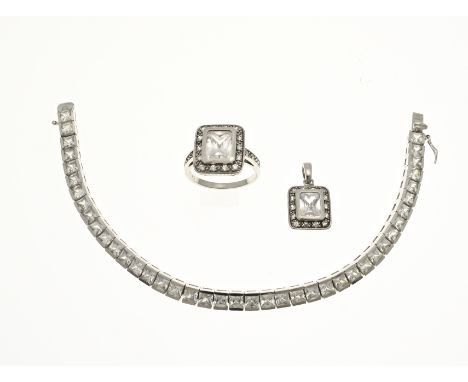 Set of silver jewelry, 925/000, with zirconia. Bracelet with rectangular cut zirconia, width 5.5 mm. length 18.5 cm. A ring w