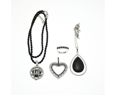 Lot silver jewelry, with a pendant with zirconias, necklace and a pendant with black stone, a ring and a black cord with roun