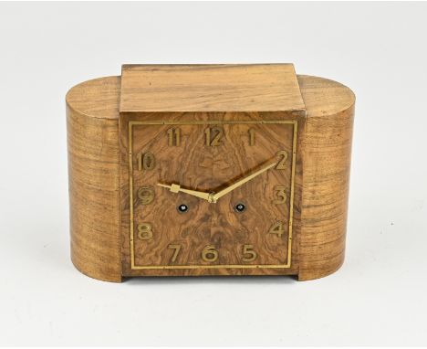 Art Deco pendulum clock in walnut. Dial is made of burr walnut. Clockwork by Gustav Becker. Circa 1920. Dimensions: 20 x 25 x