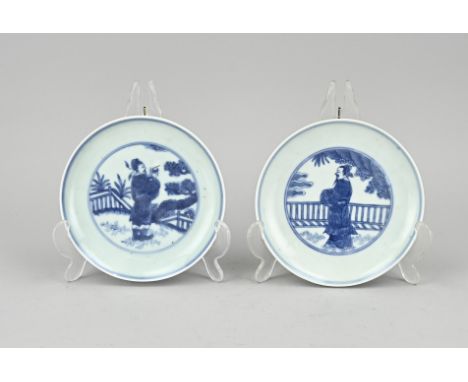 Two 18th century Chinese porcelain plates. With double blue bottom ring. Wise man in garden decoration. One plate chip. One p