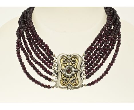 Choker with garnet and silver. Choker with 7 rows of faceted garnets, ø 4 mm. Attached to a large rectangular silver clasp wi