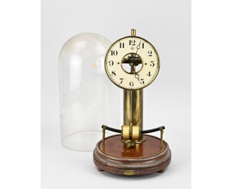 Antique electric bulle clock under glass dome. Not tested. Dimensions: H 38 cm. In good condition.