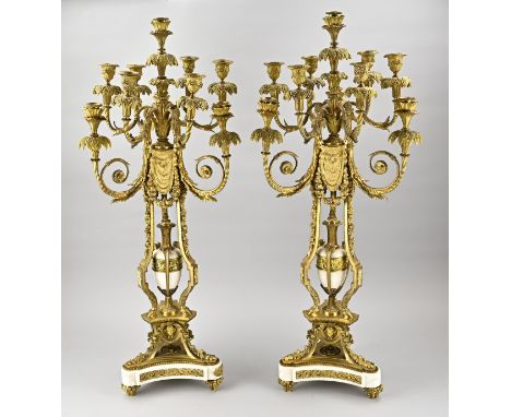 Two very large, white Carrara marble candlesticks with gilded bronze fittings. 9-Light. Circa 1850. A few corner ornaments ar