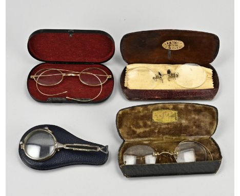 Four glasses, one silver lorgnette with onyx and marcasite and 3 double glasses, one 12 crt. In cases. In good condition.