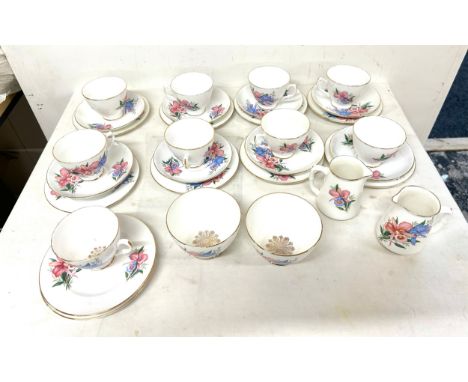 Part Dorchester tea service to include saucers, jugs, bowls, plates etc 