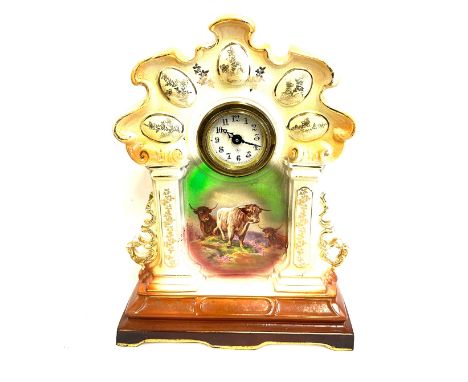 Large decorative pottery mantle clock measures approximately 17.5 inches tall 