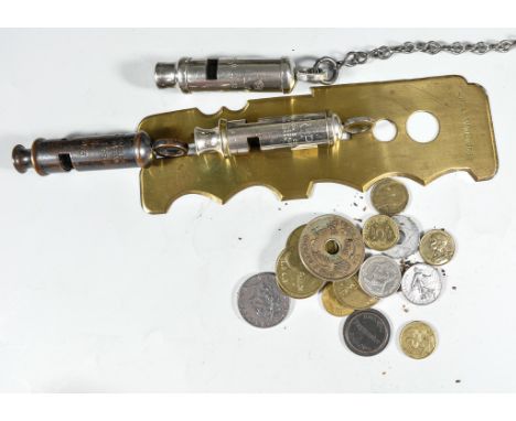 A Queen Mary Christmas tin with tobacco, brass buttons and brass cleaning guard stamped 1955, three whistles - ARP, AM and Hu