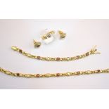 Schmuckset mit Brillanten und Rubinen besetzt, 750 GG, insg. ca. 1,5ct Brillantbesatz