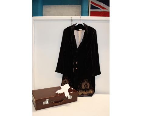 A vintage leather suitcase and contents 