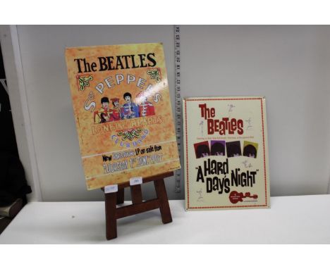 Vintage wooden table easel and two reproduction tin plate Beatles signs 