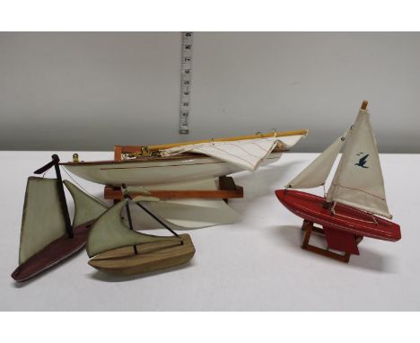 A selection of vintage wooden boats etc 