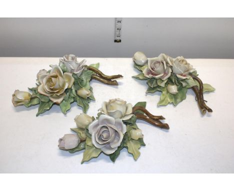 Three vintage Capodimonte wall hanging flower sculptures 