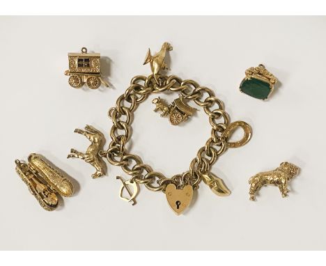 9CT GOLD CHARM BRACELET 70.3 GRAMS APPROX