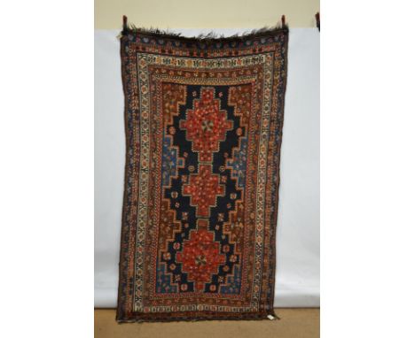 Afshar long rug, Kerman area, south west Persia, circa 1920s, 9ft. 2in. x 4ft. 10in. 2.80m. x 1.47m. Long repaired crease mar