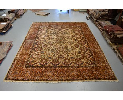 Saruk cream field carpet, north west Persia, mid-20th century, 15ft. x 11ft. 9in. 4.57m. x 3.58m. Some wear in places; heavy 