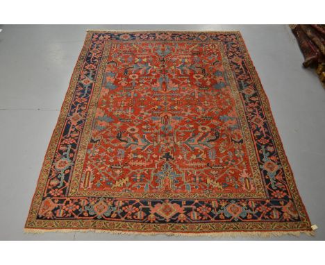 Heriz carpet, north west Persia, about 1920s, 10ft. 8in. x 8ft. 2in. 3.25m. x 2.49m. Overall wear; slight loss to top end. No