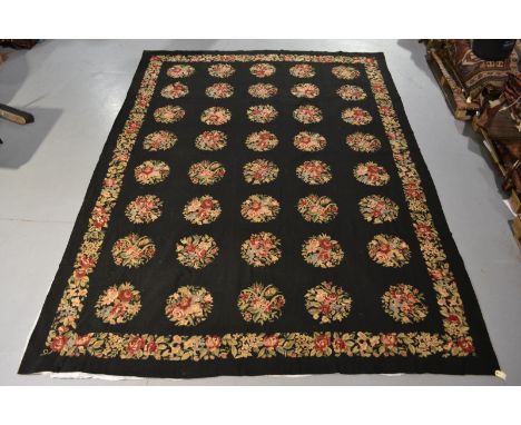 Striking floral needlework carpet, probably east European, 20th century, 12ft. 10in. x 9ft. 6in. 3.90m. x 2.90m. Heavy cotton