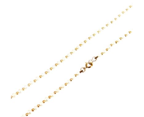 A seed pearl and orb necklace, with plain clasp, marked 9ct, 40cm long.