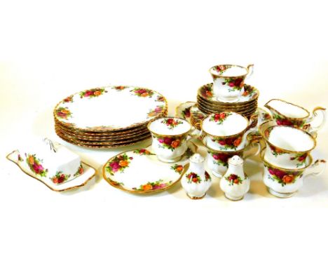 A Royal Albert Old Country Roses part service, to include a serving plate, 26cm wide, cups, saucers, dinner plates, printed m