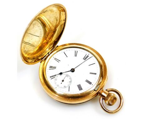 A 20thC gold plated hunter pocket watch, of circular form with 4cm diameter Roman numeric dial and Arabic date aperture, in a