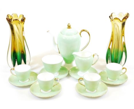 A Wedgwood bone china part coffee service, comprising coffee pot 25cm high, milk jug, sugar bowl, four cups and six saucers, 