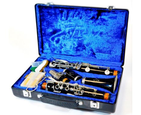 A 20thC Buffet clarinet, five piece, with chrome finish mouthpiece, ebonised body in fitted case, 34cm wide.