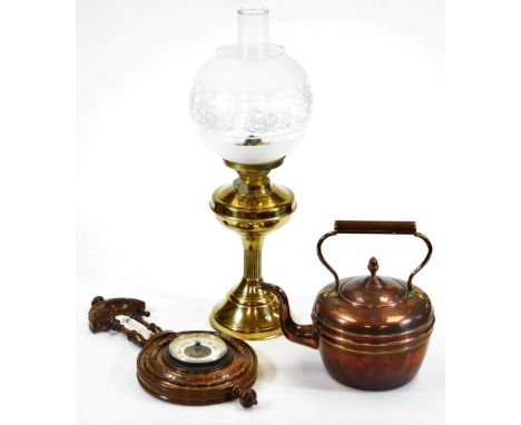 An early 20thC cooper kettle, with fixed cylindrical handle and shaped body, 28cm high, a brass oil lamp with frosted and cle