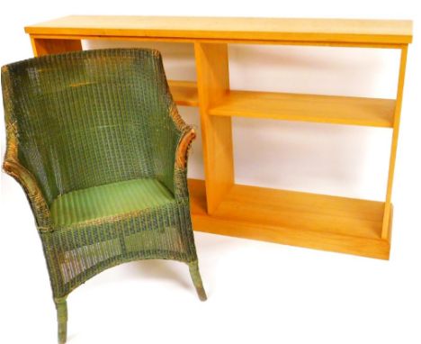 A light oak freestanding bookcase, of rectangular form with removable shelves, on a block base, 149cm wide, 31cm deep, Lloyd 