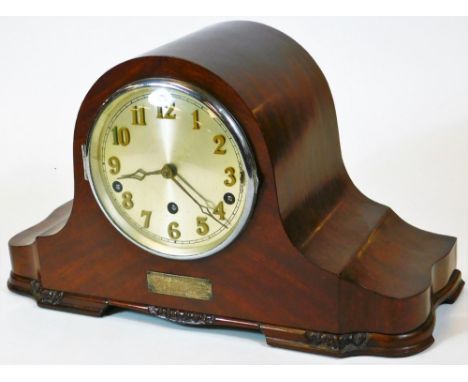 An early 20thC walnut cased Napoleon hat mantel clock, in shaped case with 14cm diameter Arabic dial revealing a chiming move