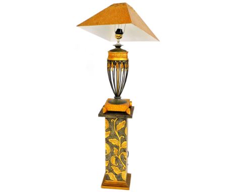 A modern table lamp, on pedestal stand with pieced main body and shaped shade in gilt and grey colours, the lamp 84cm high, t