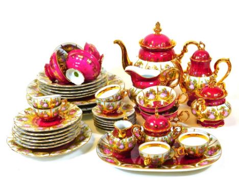 A 20thC Alt Wien Vienna porcelain part tea service, to include teapot 26cm high, three plates, serving sandwich plate, small 