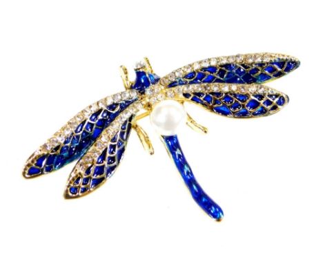 A costume dragonfly brooch, set with white stones with an enamel style body and single faux pearl with plain pin back, 5cm wi