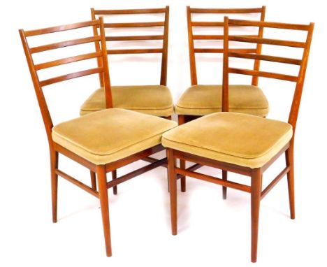 A set of Vintage Meredew teak ladder back dining chairs, each with four horizontal splats, on turned legs with overstuffed se