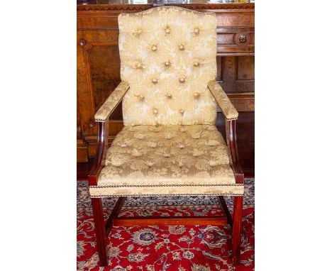 An armchair of Georgian design, yellow damask button upholsteredNote: located at the vendor's property in South Derbyshire.  