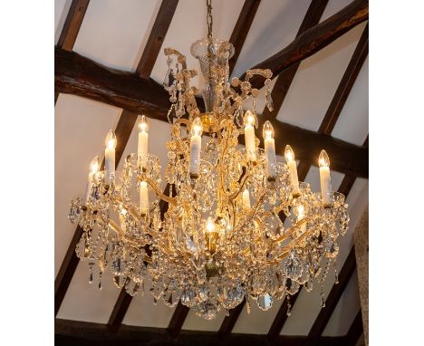 A fifteen light two tier pendant electrolier, clear facet cut beads and droppers, drop approximately 110cmNote: located at th