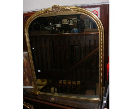 Decorative gilt over mantel mirror