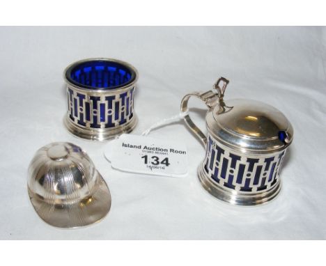 A silver mustard pot, salt pot and caddy spoon