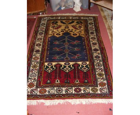 Middle Eastern carpet with geometric border and centre medallions - 180cm x 120cm