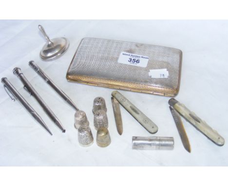 Engine turned cigarette case, thimbles, etc
