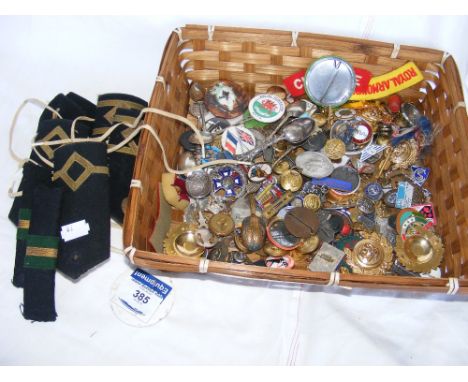 Various collectables including epaulettes, badges, etc