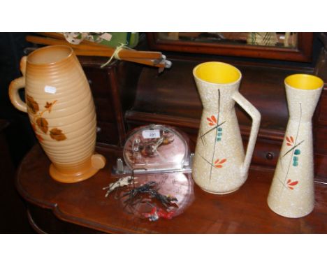 A Deco mantel clock, pottery, etc.