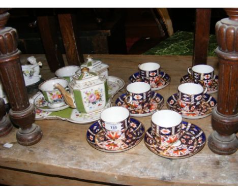 Selection of Royal Crown Derby cups and saucers, etc.