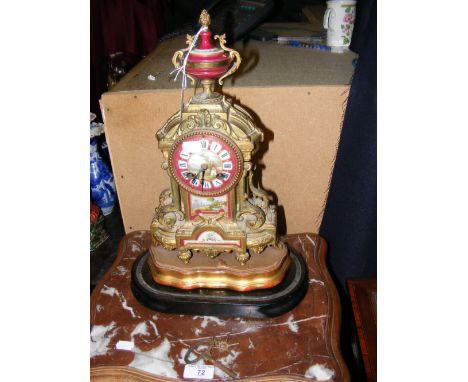 Decorative gilt French mantel clock with hand painted porcelain face, standing on wooden plinth - 40cm high