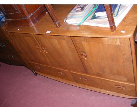 A Retro Ercol sideboard with three doors and two drawers below