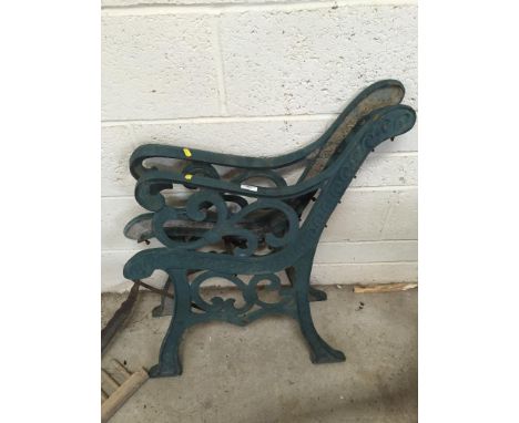 A pair of cast iron bench ends