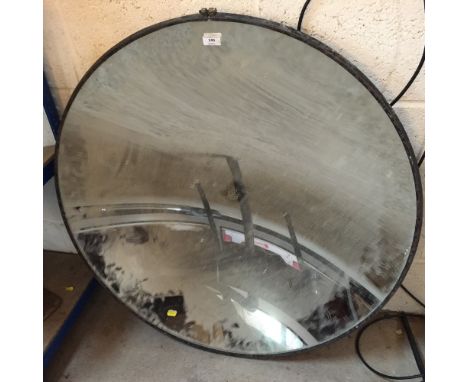 A World War II period search light reflector mirror of concave shape, approx. 93cm dia.