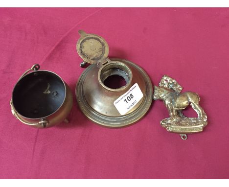 A brass inkwell with Suffolk Punch motif; a Suffolk Punch door knocker; and a brass cauldron with Suffolk Punch emblem
