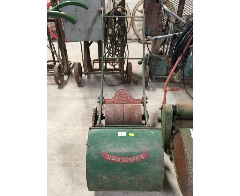 A Ransomes Simms &amp; Jefferies patent chain automaton lawn mower, complete with collection box