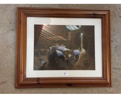 A pine framed photograph of a Vintage sports car