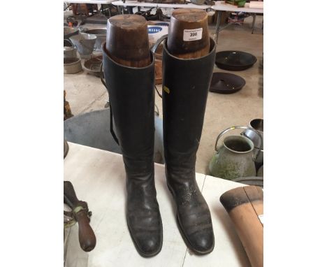 A pair of Vintage leather riding boots, complete with wooden trees